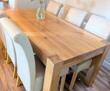 Solid oak dining table and 6 dining chairs