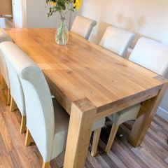 Solid oak dining table and 6 dining chairs