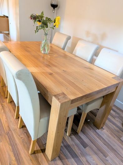 Solid oak dining table and 6 dining chairs