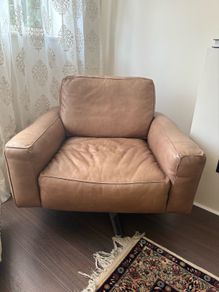 leather swivel armchair