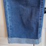 Mid-wash Distressed Jeans with Cuffed Hem. Image 4