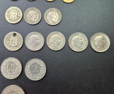 Swiss coins, including silver examples