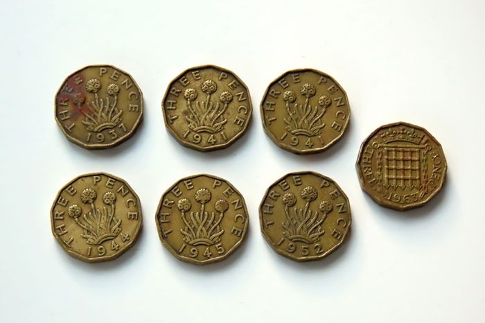 Brass old British threepence coins X 7