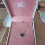 silver necklace with green stone Image 3