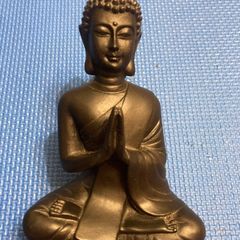 Solid wood black Buddha figurine in a meditative pose Statue