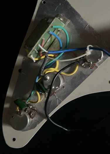 Fender Squier Stratocaster harness wired up to volume pot 2 tone potentiometers