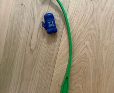 Dog ball thrower and bag dispenser