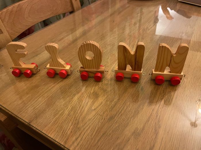 Assortment of wooden letters on wheels