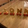 Assortment of wooden letters on wheels Image 3