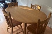 Sturdy wooden dining table and four chairs set