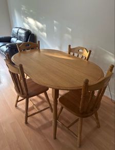 Sturdy wooden dining table and four chairs set