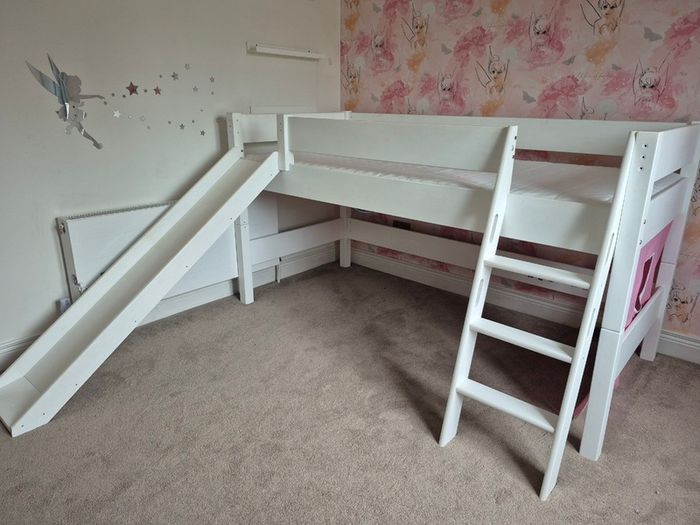 Mid sleeper bed with slide