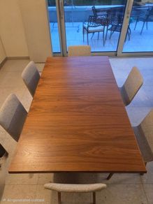 Dining table & 6 chairs - L175cm x W100cm extendable to 275cm. Brushed stainless steel central base with 6 Skovby Walnut chairs. Perfect condition. Downsizing.
