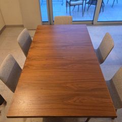 Dining table & 6 chairs - L175cm x W100cm extendable to 275cm. Brushed stainless steel central base with 6 Skovby Walnut chairs. Perfect condition. Downsizing.