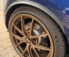 Carbon fibre stick on wheel arches