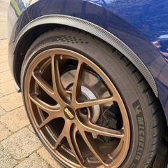 Carbon fibre stick on wheel arches
