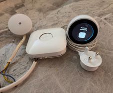 Nest thermostat, stand, boiler controller