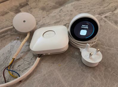 Nest thermostat, stand, boiler controller