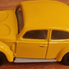 4 vintage toy cars -