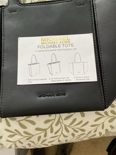 New Michael Kors black bag( can be folded flat for holidays)