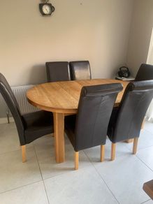 Solid extendable oak table- very good in
