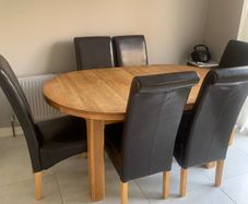 Solid extendable oak table- very good in