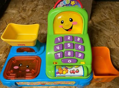 Fisher Price Laugh and Learn Magic Market cash register toy