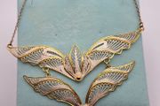 sterling silver golden lark wings necklace