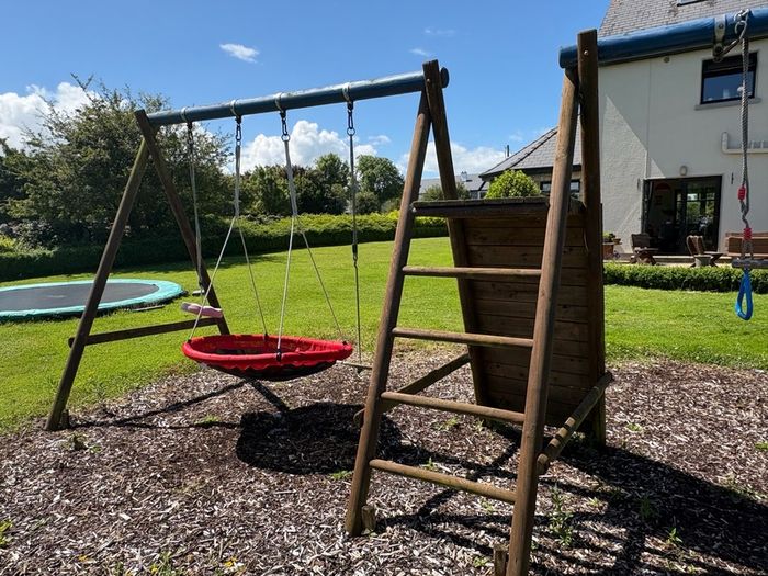 Swing slide climbing wall