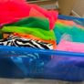 Box of assorted colourful tulle and fabric materials Image 2