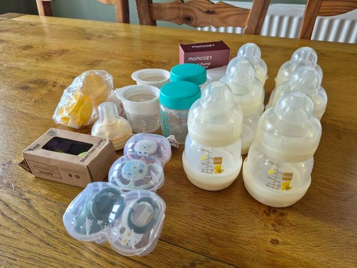 Newborn bottles, soothers, pump parts
