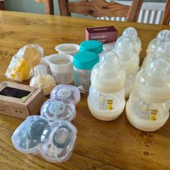 Newborn bottles, soothers, pump parts