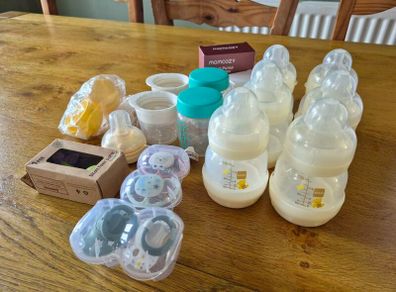 Newborn bottles, soothers, pump parts