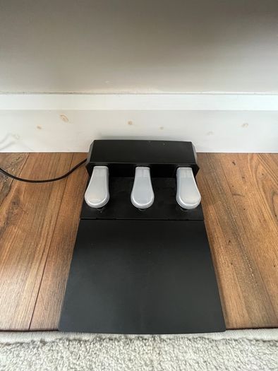 piano, bench and audio transmitter