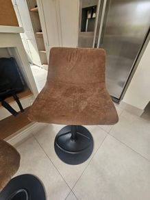 Three leatherette barstools