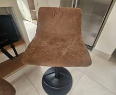 Three leatherette barstools