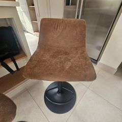 Three leatherette barstools