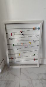 Wall Photo Display with Pegs and Strings