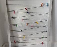 Wall Photo Display with Pegs and Strings