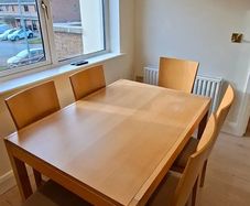 Extending kitchen table and six chairs