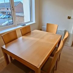 Extending kitchen table and six chairs