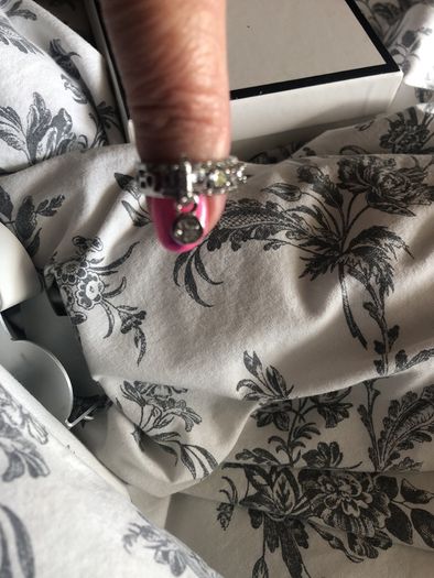 costume ring with dangely stone