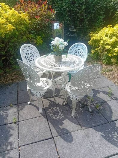 cast iron table and chairs