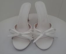 White bow heels
