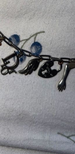 CHRISTIAN DIOR Vintage Silver Tone Figural Charm Necklace