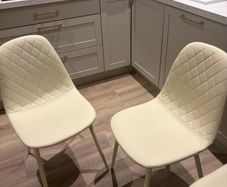 Set of 4 cream dining chairs