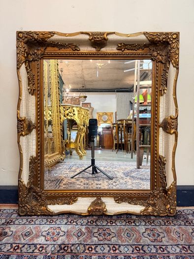 Parcel Gilt and Painted Bevelled Glass Mirror