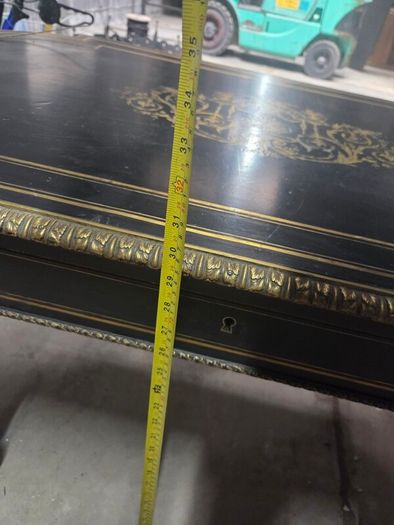 A 19th Century French Ebonised and Brass inlay and Metal Mounted Table with Drawer