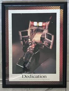 Framed Motivational Dedication Photo showing ambulance crew loading patient into rear of ambulance.