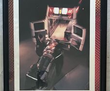 Framed Motivational Dedication Photo showing ambulance crew loading patient into rear of ambulance.